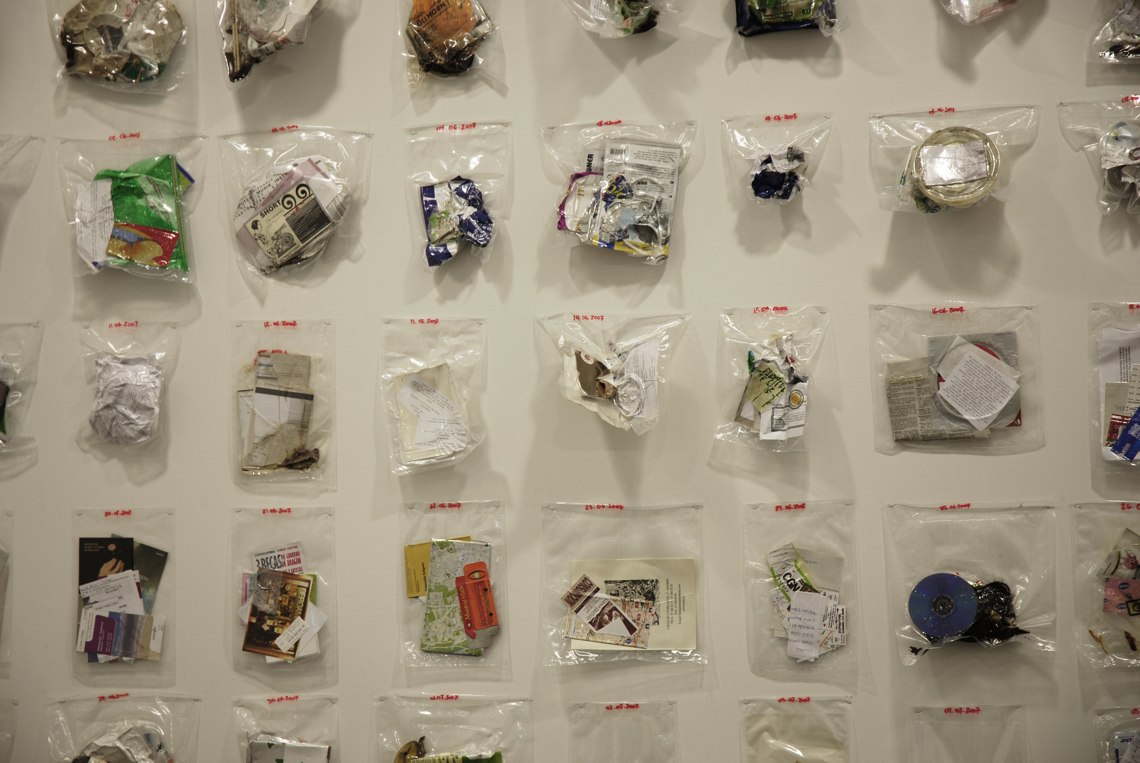 daily trash vacuumed in sealed plastic bags